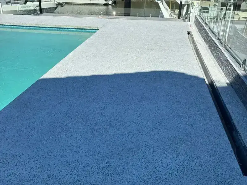Honed exposed aggregate outdoor entertainment floor sealed by SurfacePro Flooring Brisbane