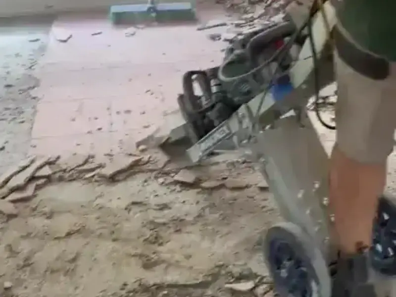 Walk-behind diamond grinding machine preparing a concrete subfloor in Brisbane